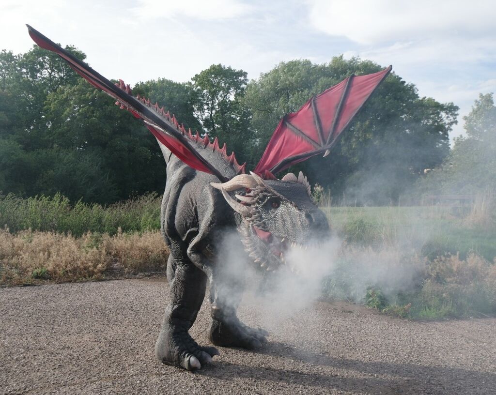 Dragon breathing smoke at Jimmy’s Farm & Wildlife Park, Ipswich Suffolk Dragon breathing smoke at Jimmy's Farm & Wildlife Park, Ipswich Suffolk