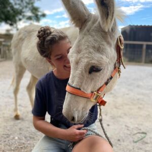 Lilly the donkey with a ranger at Jimmy's Farm & Wildlife Park